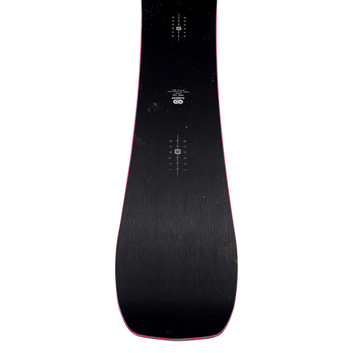 The top of a snowboard shown vertically against a white background, featuring a dark black base with a thin pink edge and white printed graphics.