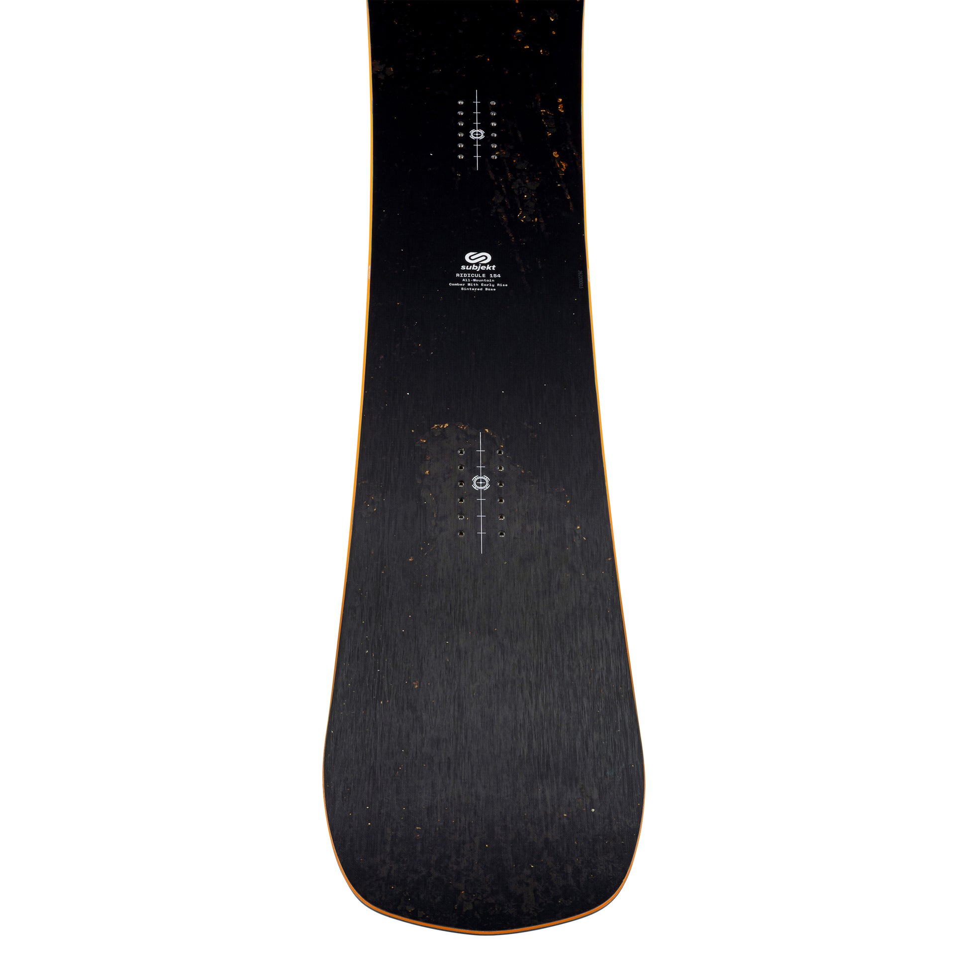 A close-up, top-down view of a snowboard's toppsheet, showing a dark black rust grain surface with subtle orange edge striping and white printed graphics.