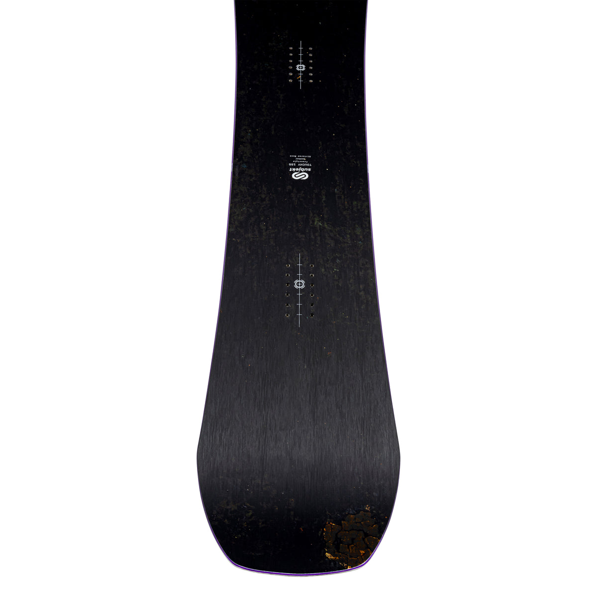 The top of a snowboard shown vertically against a solid white background, featuring a dark textured finish with white printed binding device alignment markings and a small gold logo near the center.